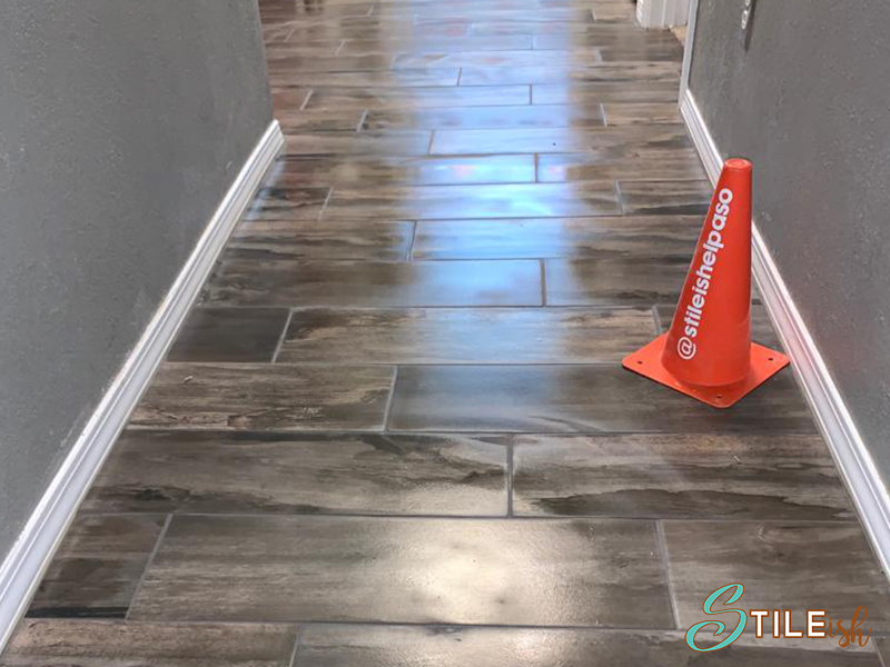 gray wood look tile hallway